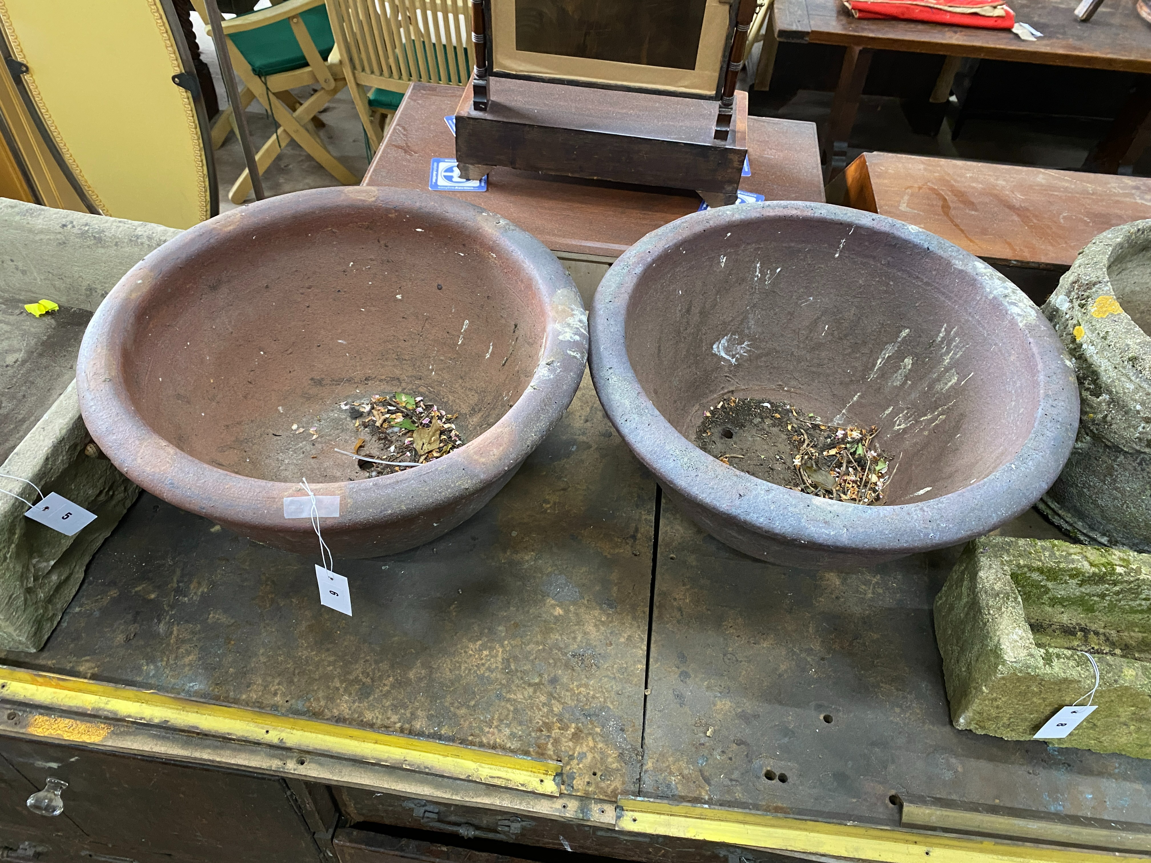 A near pair of circular terracotta garden planters, larger 55 cm Dia, H 27 cm